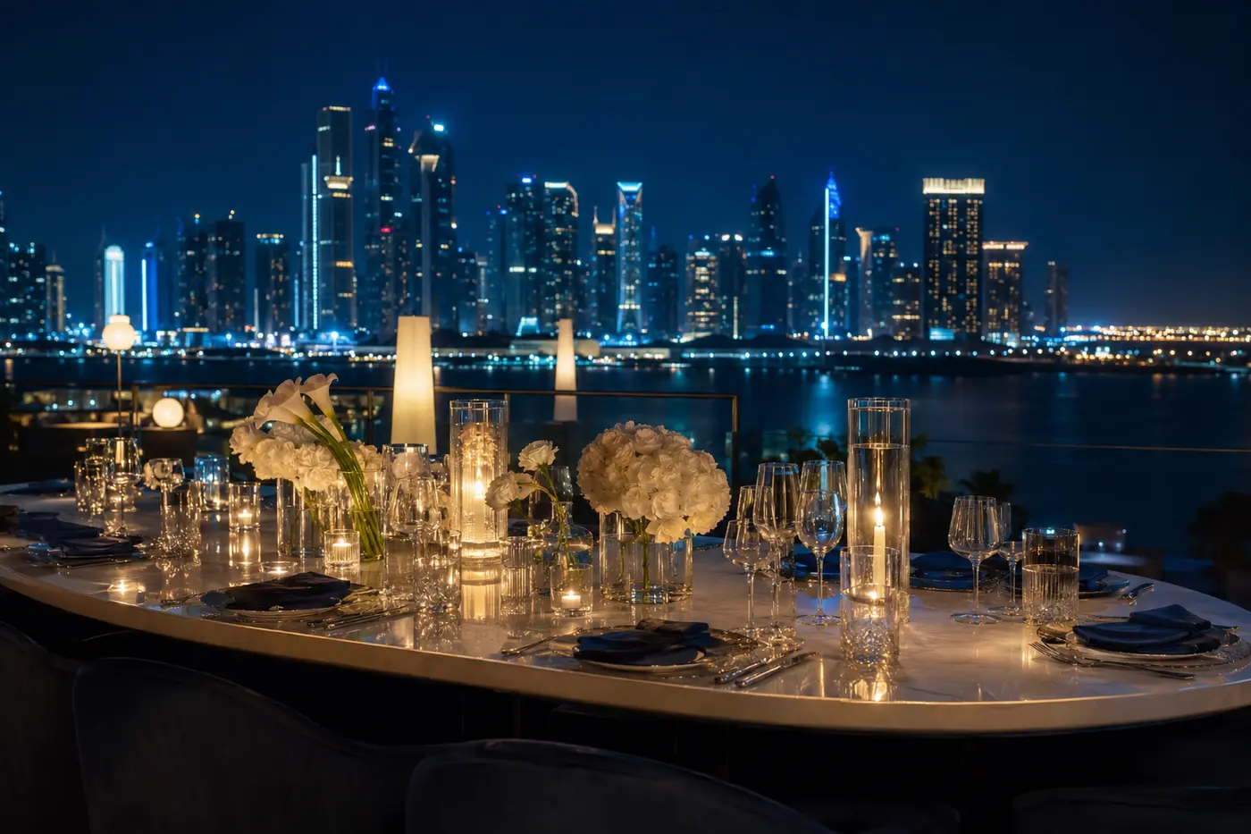 Private rooftop dinner overlooking a city skyline